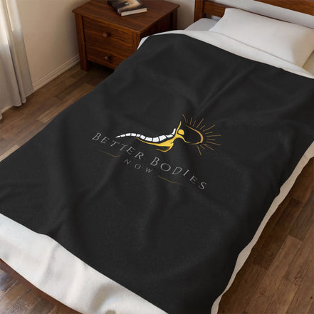 Better Bodies Now Velveteen Plush Blanket – Soft Wellness Throw with Spine & Sun Logo